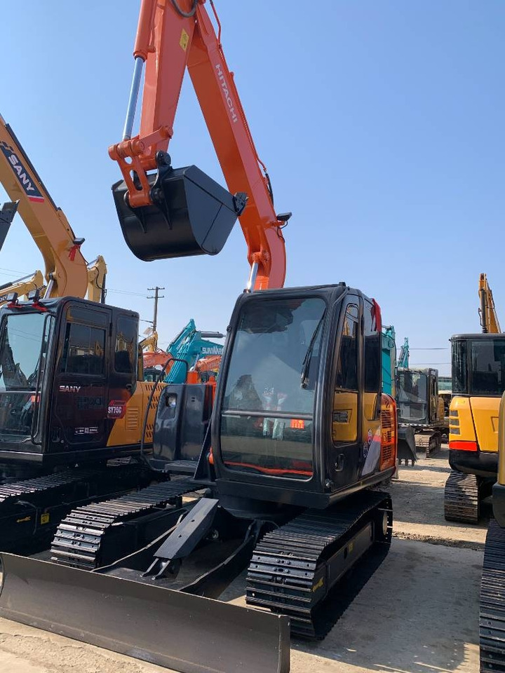 Hitachi 70 - Ekskavator me zinxhirë: foto 1 Hitachi 70 - Ekskavator me zinxhirë: foto 1