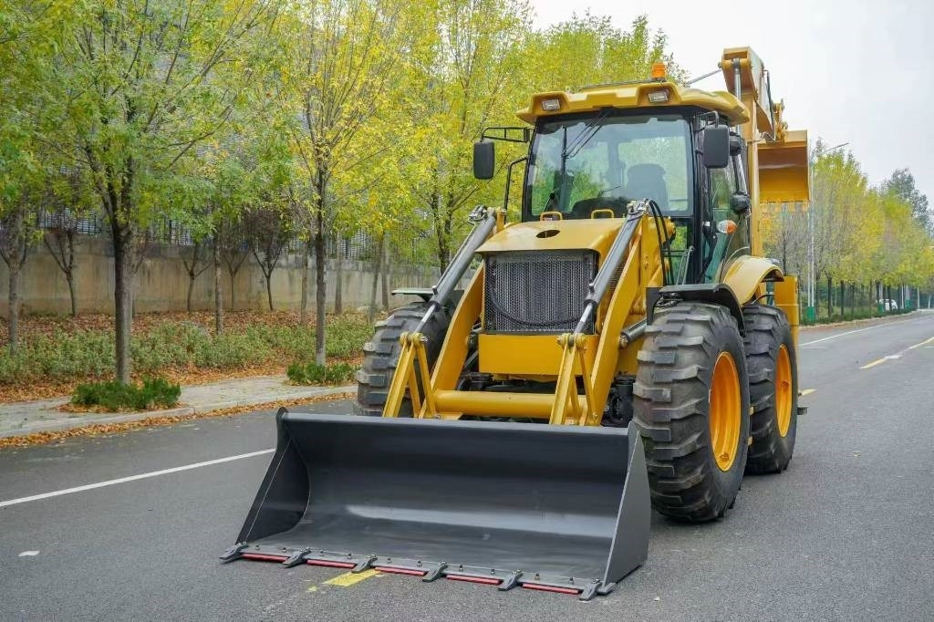 JCB 3 CX - Fadromë me shkarkim nga prapa: foto 1 JCB 3 CX - Fadromë me shkarkim nga prapa: foto 1