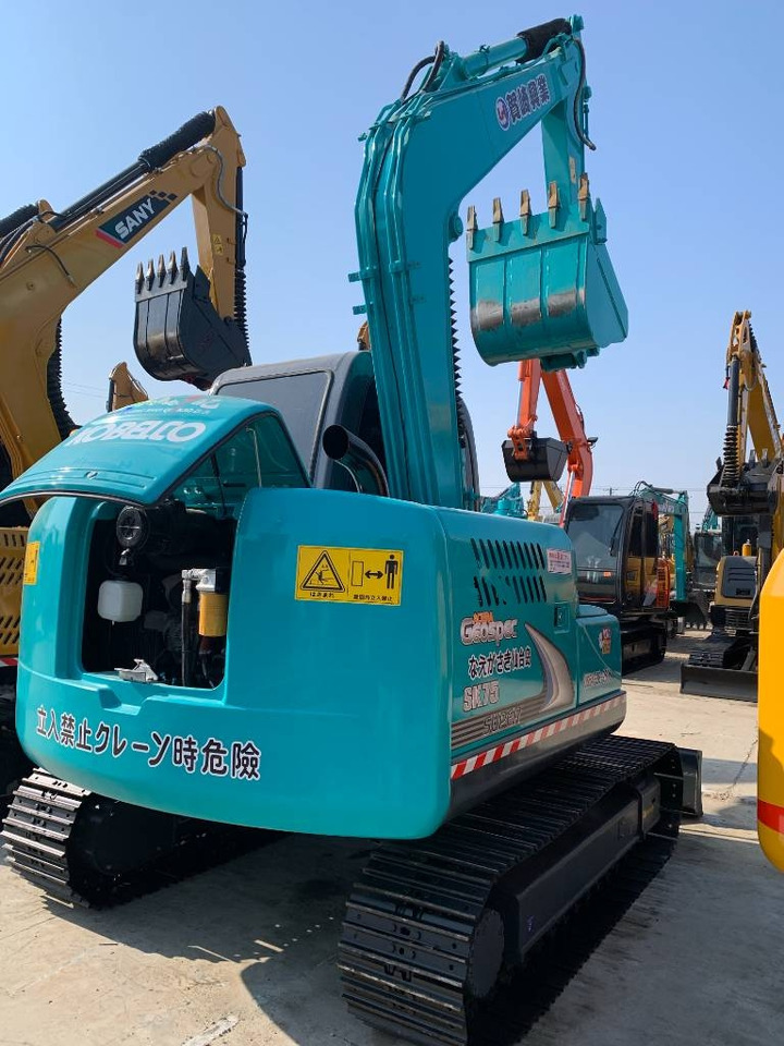 Kobelco SK 75 - Ekskavator me zinxhirë: foto 1 Kobelco SK 75 - Ekskavator me zinxhirë: foto 1