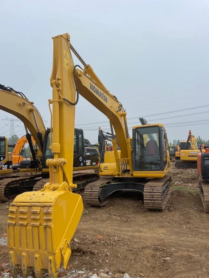 Komatsu PC 120 - Ekskavator me zinxhirë: foto 1 Komatsu PC 120 - Ekskavator me zinxhirë: foto 1