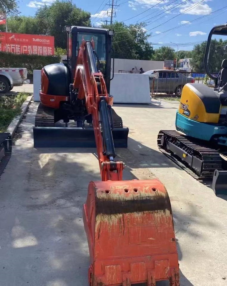 Ekskavator me zinxhirë Kubota 163: foto 7