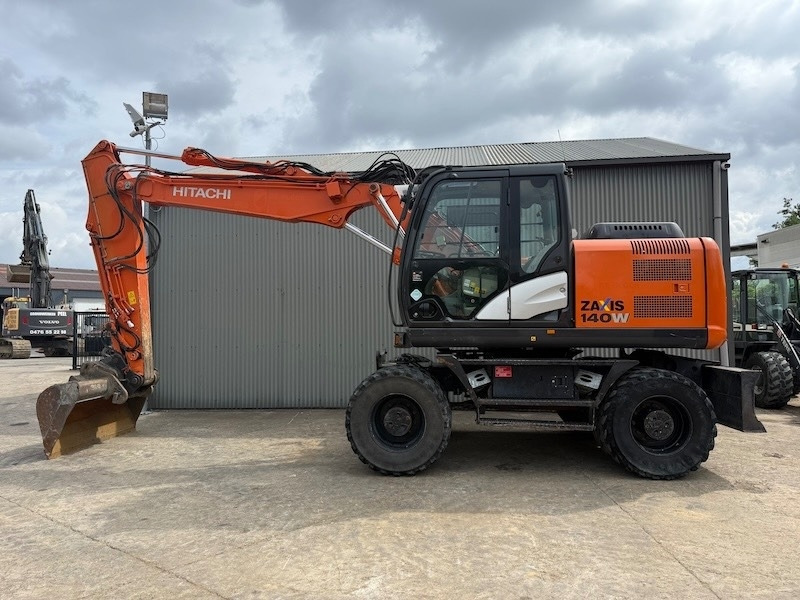 Hitachi ZX 140 W-5 - Ekskavator me goma: foto 1 Hitachi ZX 140 W-5 - Ekskavator me goma: foto 1