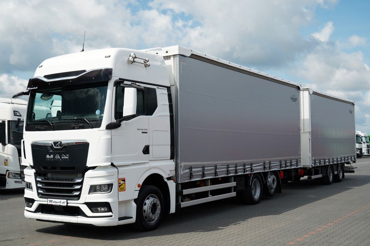 MAN TGX 26.470 / ZESTAW TANDEM 120 M3 / PRZEJAZDOWY - Kamion me tendë: foto 1 MAN TGX 26.470 / ZESTAW TANDEM 120 M3 / PRZEJAZDOWY - Kamion me tendë: foto 1