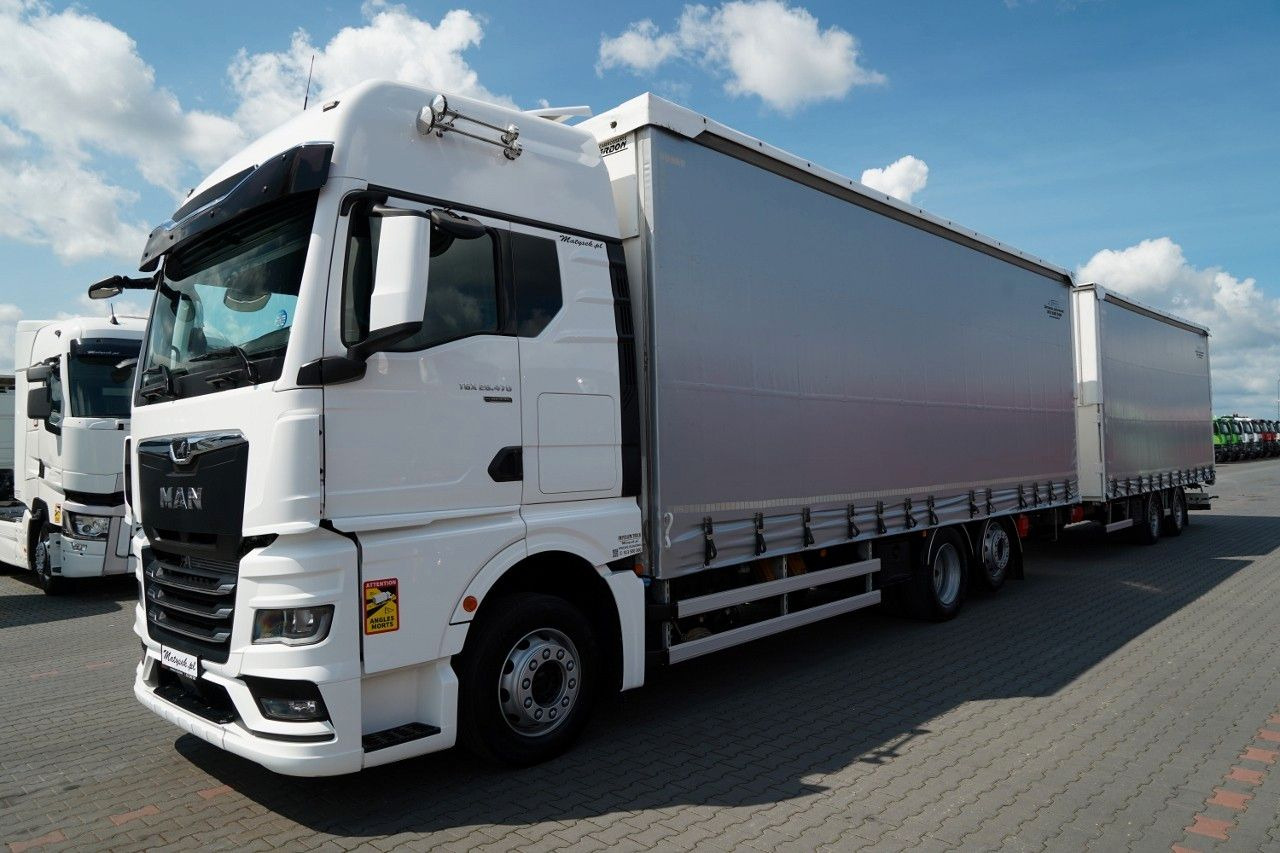MAN TGX 26.470 / ZESTAW TANDEM 120 M3 / PRZEJAZDOWY - Kamion me tendë: foto 2 MAN TGX 26.470 / ZESTAW TANDEM 120 M3 / PRZEJAZDOWY - Kamion me tendë: foto 2