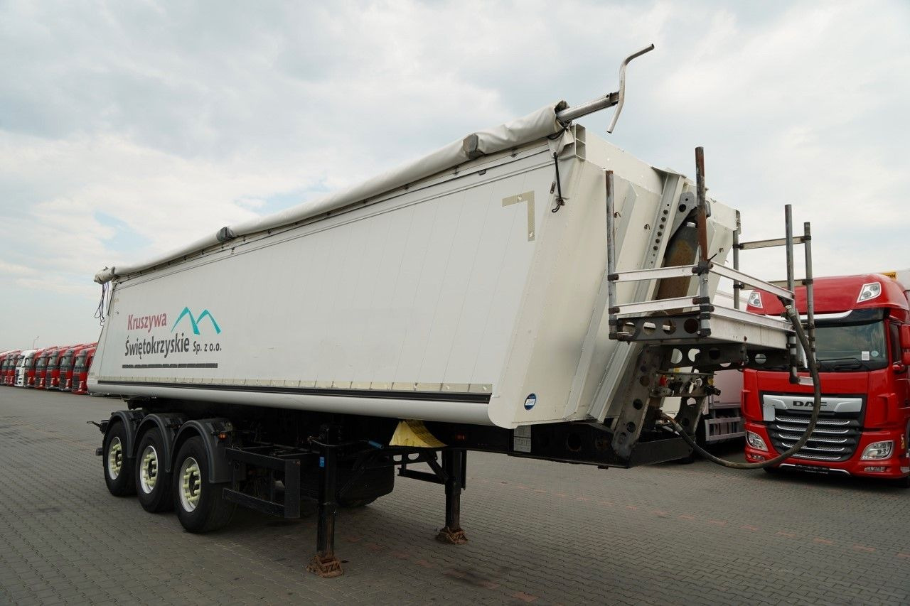 Schmitz Cargobull / WYWROTKA / ALUMINIOWA / OŚ PODNOSZONA / OSIE - Gjysmë rimorkio vetëshkarkuese: foto 2 Schmitz Cargobull / WYWROTKA / ALUMINIOWA / OŚ PODNOSZONA / OSIE - Gjysmë rimorkio vetëshkarkuese: foto 2