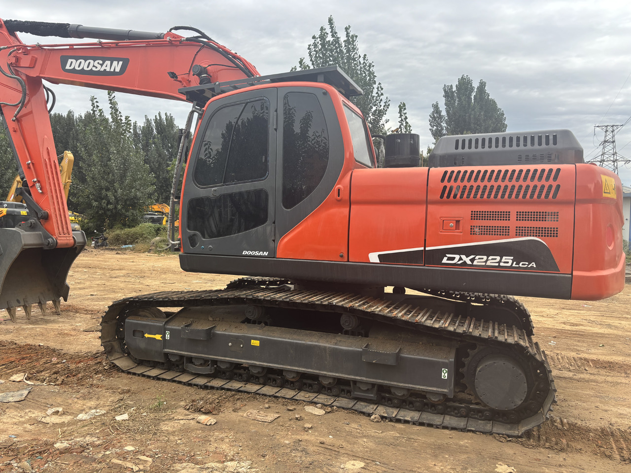 Doosan DX 225 Korea imports doosan DX225 - Ekskavator me zinxhirë: foto 4 Doosan DX 225 Korea imports doosan DX225 - Ekskavator me zinxhirë: foto 4