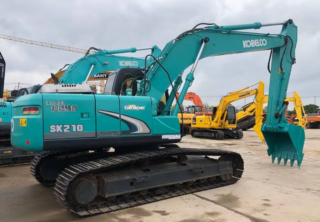Kobelco SK 210-8 - Ekskavator me zinxhirë: foto 1 Kobelco SK 210-8 - Ekskavator me zinxhirë: foto 1