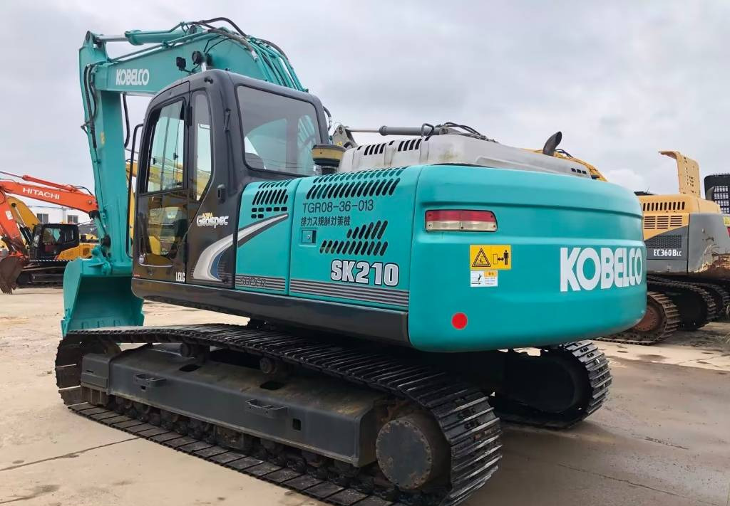 Kobelco SK 210-8 - Ekskavator me zinxhirë: foto 2 Kobelco SK 210-8 - Ekskavator me zinxhirë: foto 2
