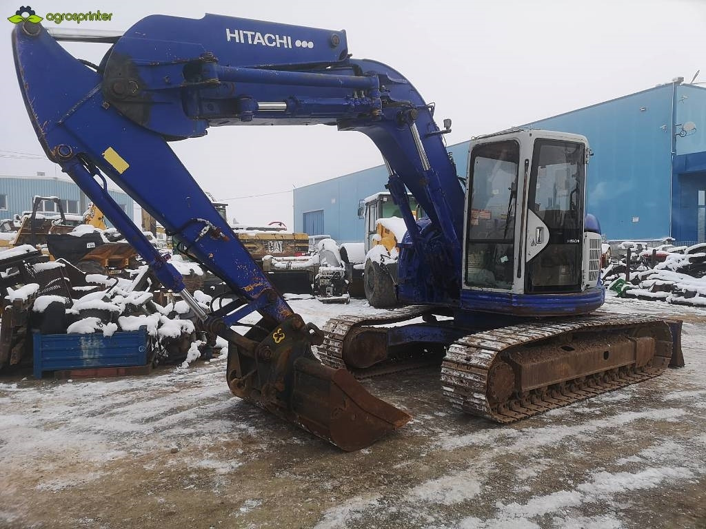 Hitachi EX 135 UR - Ekskavator me zinxhirë: foto 1 Hitachi EX 135 UR - Ekskavator me zinxhirë: foto 1