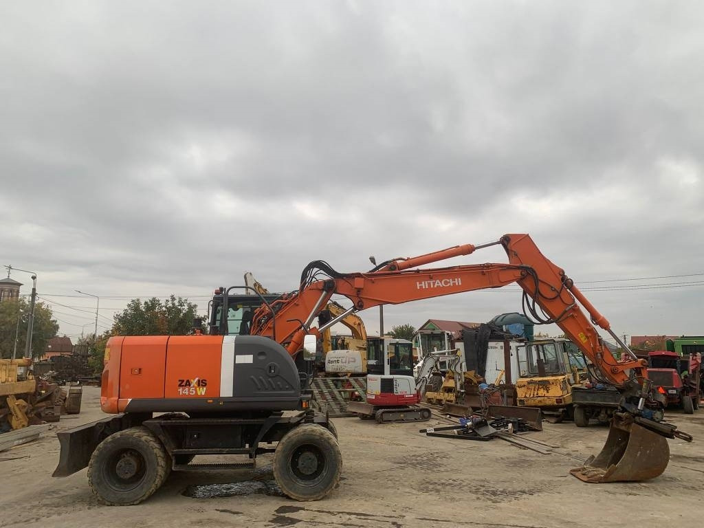 Hitachi ZX 145 W-3+SMP Rototilt - Ekskavator me goma: foto 5 Hitachi ZX 145 W-3+SMP Rototilt - Ekskavator me goma: foto 5