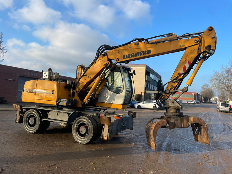 Liebherr A 316 - Ekskavator për mbetje: foto 1 Liebherr A 316 - Ekskavator për mbetje: foto 1