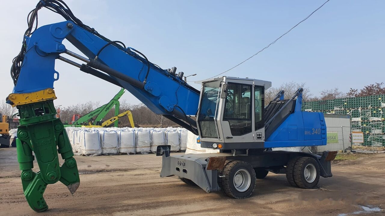 Fuchs MHL 340D FQC + LST 3to shear - Ekskavator për mbetje: foto 2 Fuchs MHL 340D FQC + LST 3to shear - Ekskavator për mbetje: foto 2