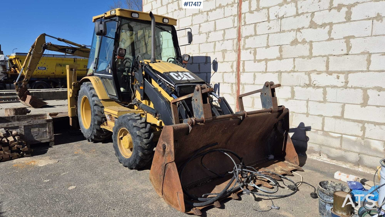 Backhoe loader CATERPILLAR 428 D 4x4 (2004) - Fadromë me shkarkim nga prapa: foto 2 Backhoe loader CATERPILLAR 428 D 4x4 (2004) - Fadromë me shkarkim nga prapa: foto 2