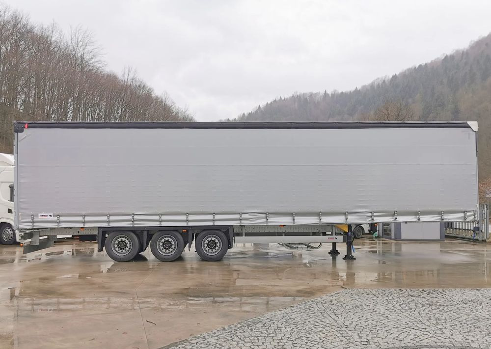 Schmitz Cargobull MEGA VARIOS - Gjysmë rimorkio me tendë: foto 4 Schmitz Cargobull MEGA VARIOS - Gjysmë rimorkio me tendë: foto 4