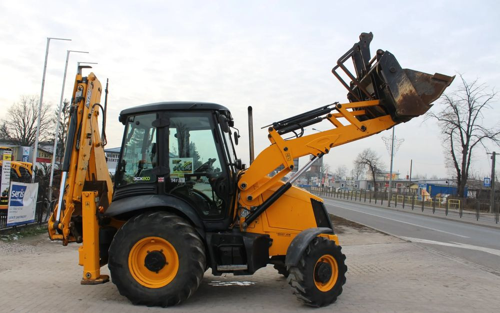 JCB 3CX - Fadromë me shkarkim nga prapa: foto 3 JCB 3CX - Fadromë me shkarkim nga prapa: foto 3