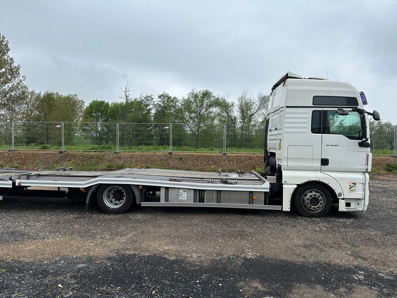 MAN TGX 18.360 Flachzug*3er*XXL*Winde*Retarder - Autotransportues: foto 3 MAN TGX 18.360 Flachzug*3er*XXL*Winde*Retarder - Autotransportues: foto 3