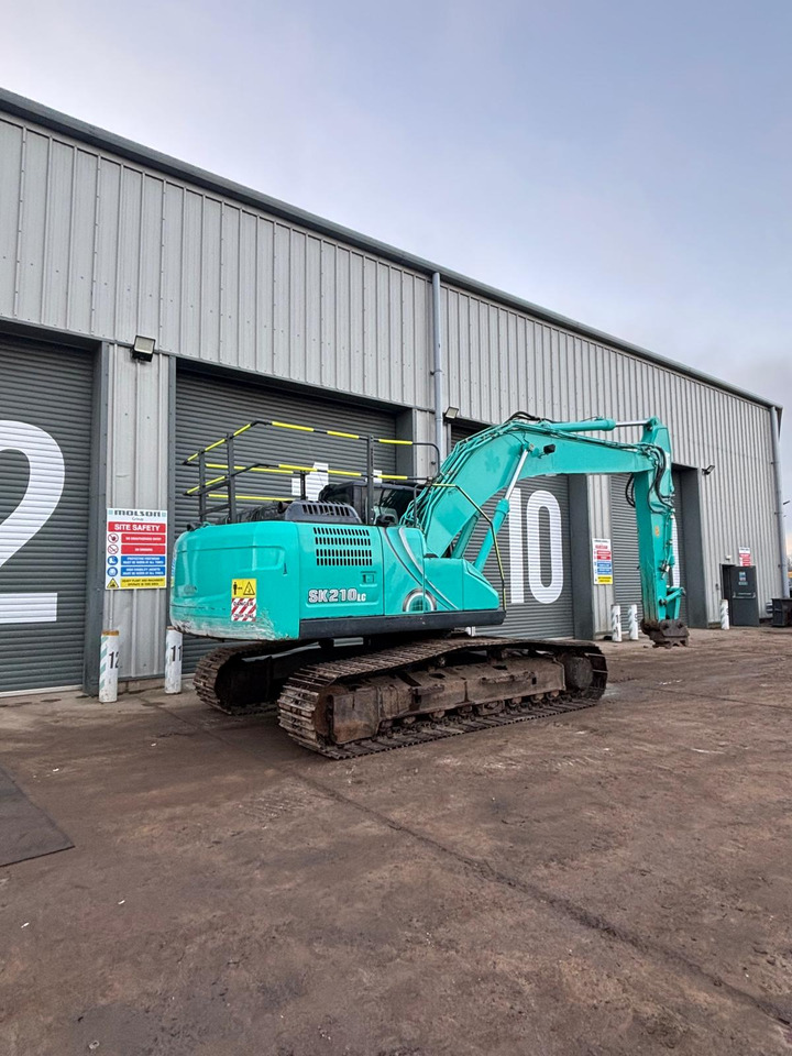 Kobelco SK210LC-10 - Ekskavator me zinxhirë: foto 5 Kobelco SK210LC-10 - Ekskavator me zinxhirë: foto 5