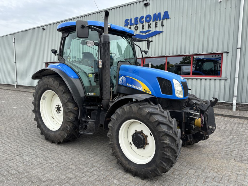 New Holland T6010 Plus Supersteer - Traktor: foto 4 New Holland T6010 Plus Supersteer - Traktor: foto 4