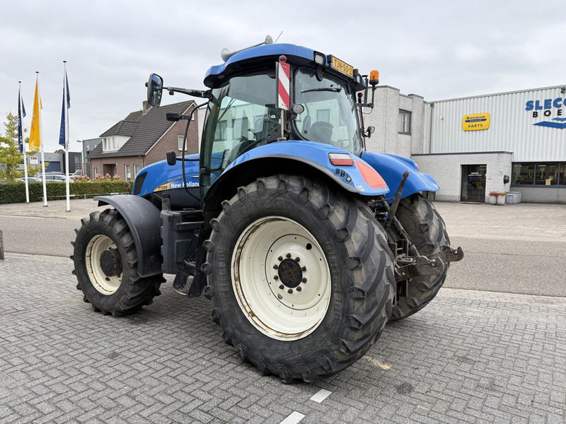New Holland T7050 Power Command - Traktor: foto 2 New Holland T7050 Power Command - Traktor: foto 2