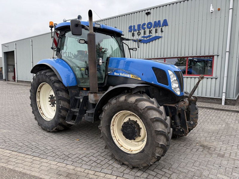 New Holland T7050 Power Command - Traktor: foto 4 New Holland T7050 Power Command - Traktor: foto 4