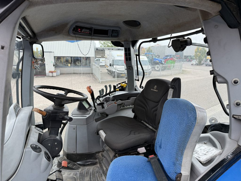 New Holland T7050 Power Command - Traktor: foto 5 New Holland T7050 Power Command - Traktor: foto 5