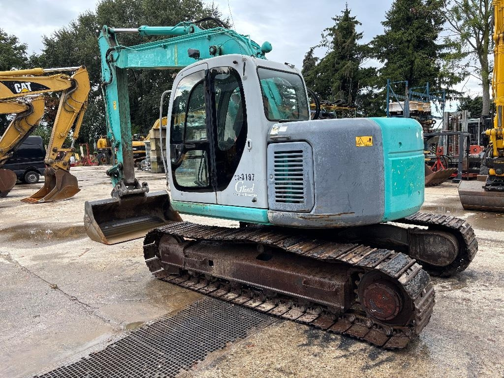 Kobelco SK 135 - Ekskavator me zinxhirë: foto 2 Kobelco SK 135 - Ekskavator me zinxhirë: foto 2