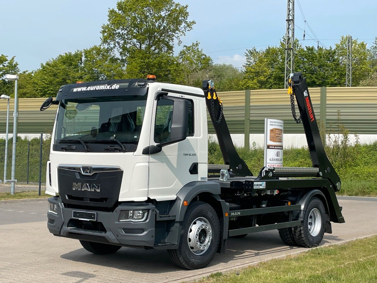 MAN TGM 18.320 4x2 Euro 6e Hiab Multilift Futura 12 - Kamion vetëshkarkues, Kamion me vinç: foto 1 MAN TGM 18.320 4x2 Euro 6e Hiab Multilift Futura 12 - Kamion vetëshkarkues, Kamion me vinç: foto 1