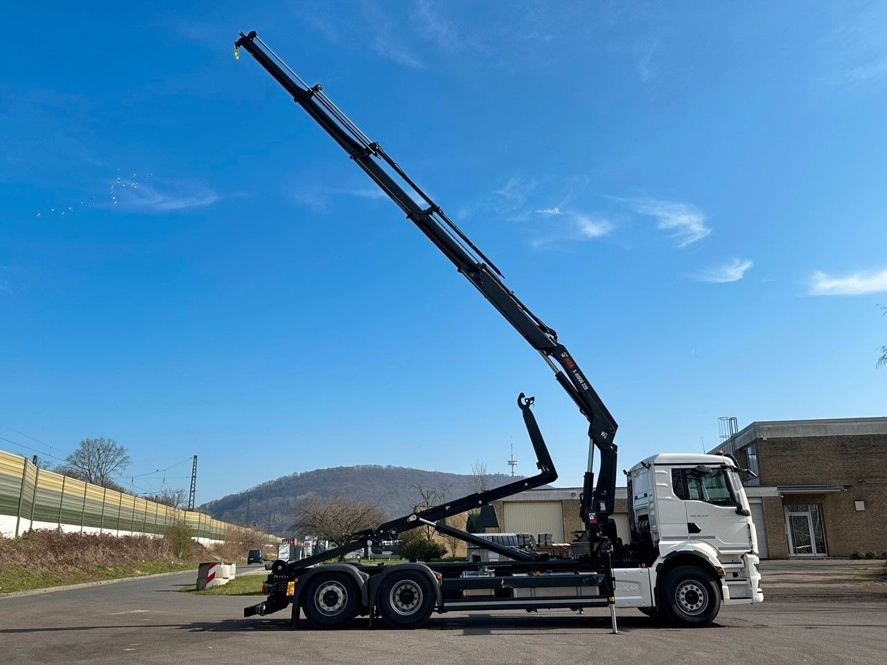 MAN TGS 26.470 6x2 Abrollkipper + Kran Hiab 228-4 - Kamion vetëngarkues, Kamion me vinç: foto 4 MAN TGS 26.470 6x2 Abrollkipper + Kran Hiab 228-4 - Kamion vetëngarkues, Kamion me vinç: foto 4
