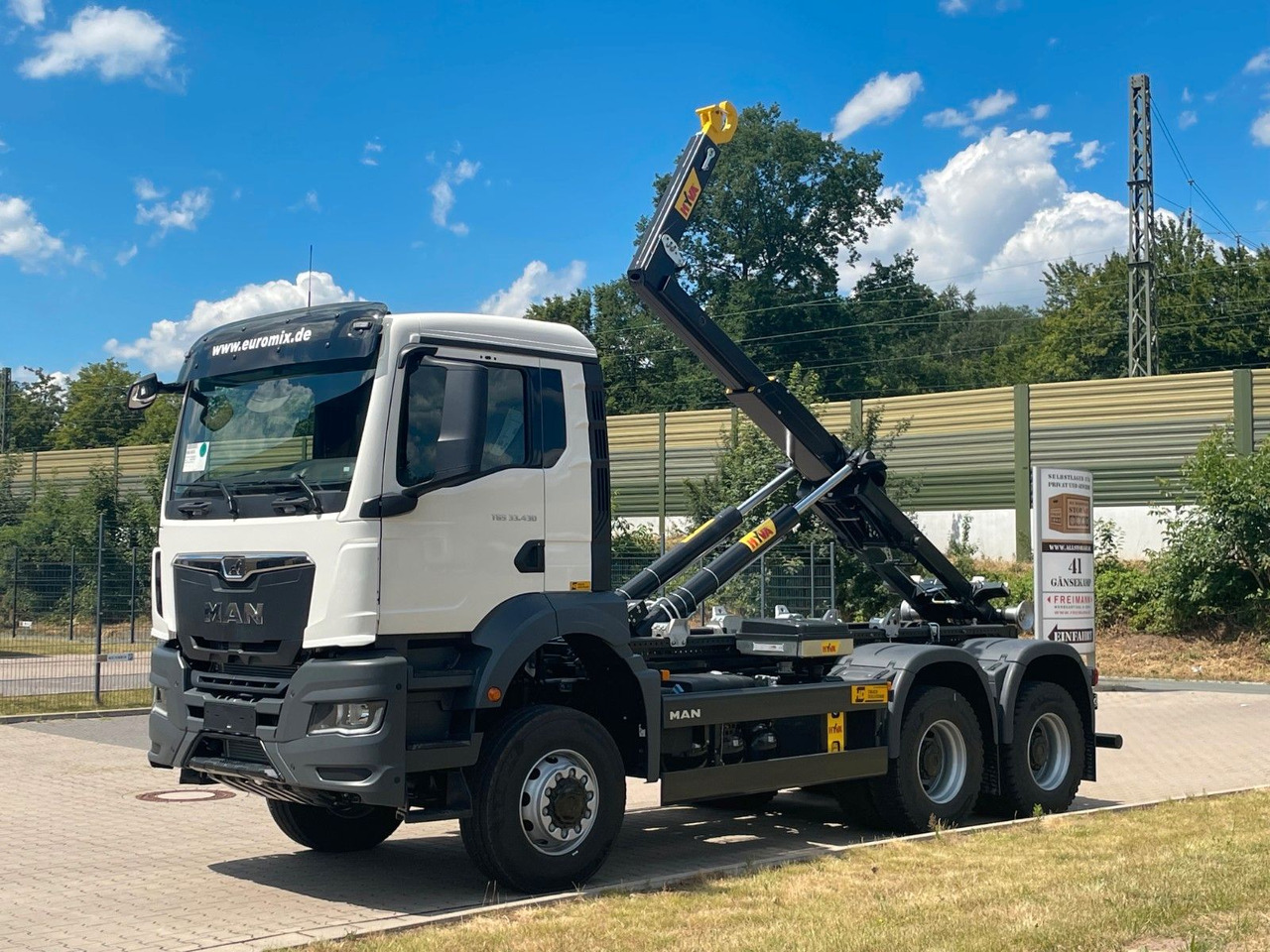 MAN TGS 33.440 6x6 Euro6e Hyva - Hiab MultiLift - Kamion vetëngarkues, Kamion me vinç: foto 1 MAN TGS 33.440 6x6 Euro6e Hyva - Hiab MultiLift - Kamion vetëngarkues, Kamion me vinç: foto 1