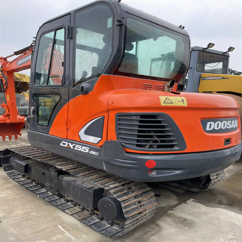 Original Color Used Doosan Dx55 Mini Excavator Used 5 Ton 5.5ton Mini Doosan Excavator for Sale Used Doosan Dx55-9c - Miniekskavator: foto 1 Original Color Used Doosan Dx55 Mini Excavator Used 5 Ton 5.5ton Mini Doosan Excavator for Sale Used Doosan Dx55-9c - Miniekskavator: foto 1