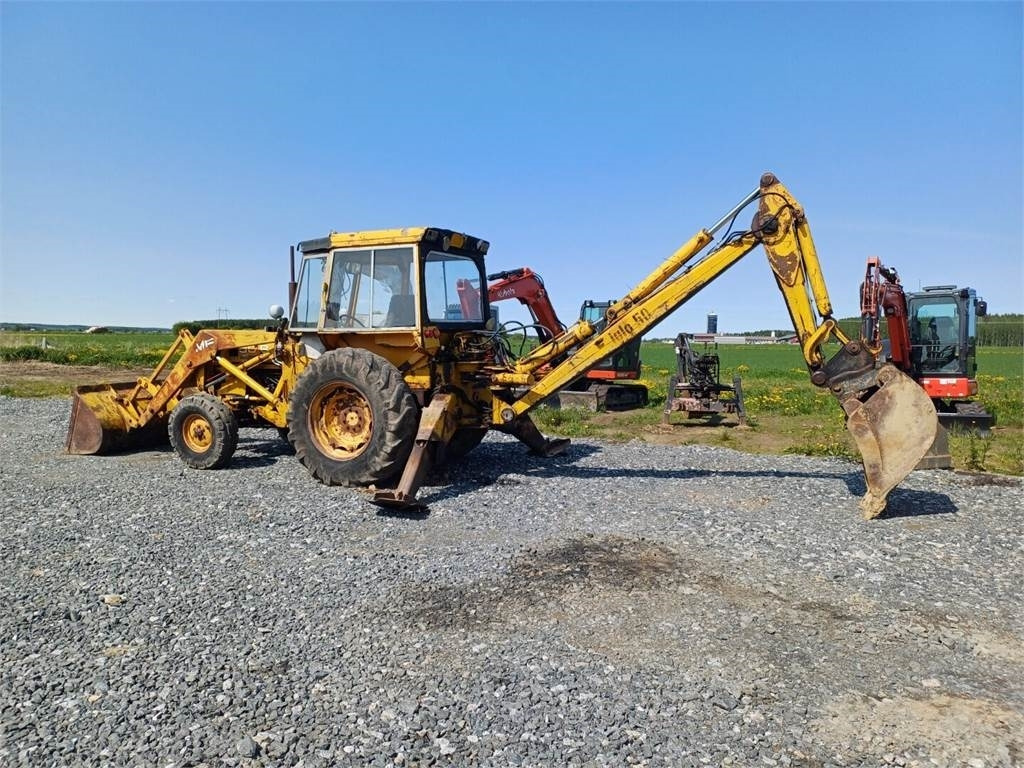 Massey Ferguson 50B traktorikaivuri - Fadromë me shkarkim nga prapa: foto 3 Massey Ferguson 50B traktorikaivuri - Fadromë me shkarkim nga prapa: foto 3