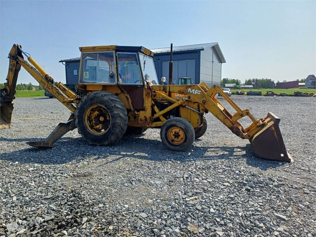 Massey Ferguson 50B traktorikaivuri - Fadromë me shkarkim nga prapa: foto 5 Massey Ferguson 50B traktorikaivuri - Fadromë me shkarkim nga prapa: foto 5