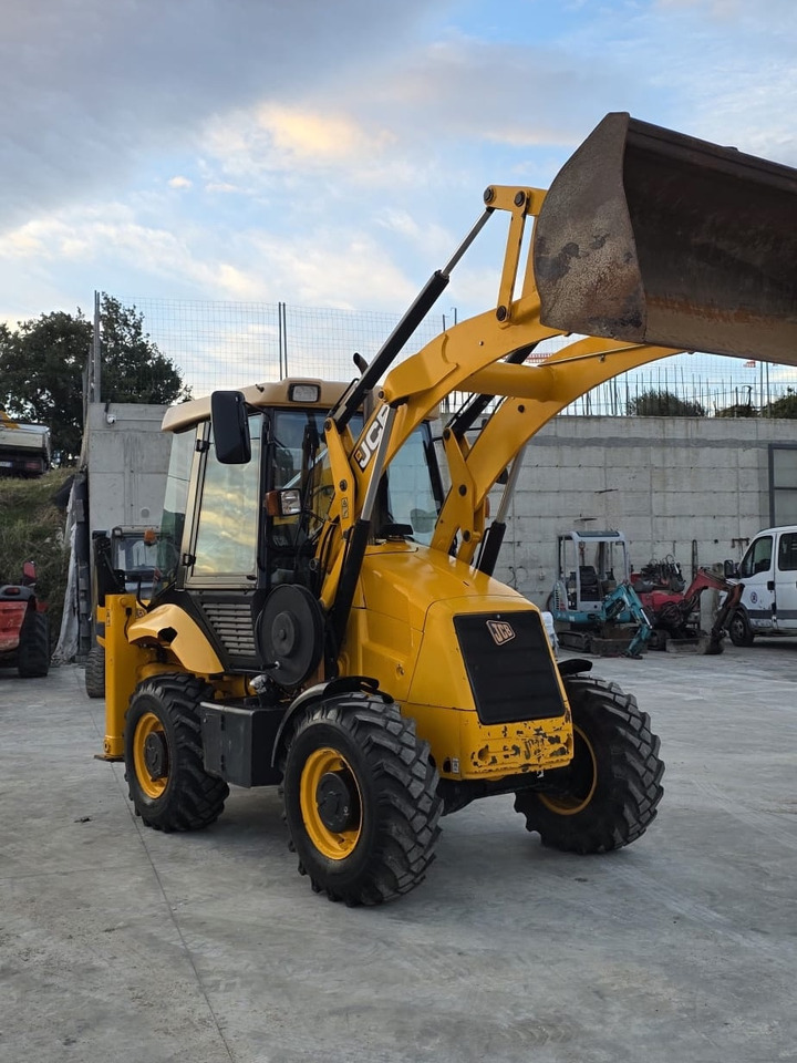JCB 2CX - Fadromë me shkarkim nga prapa: foto 5 JCB 2CX - Fadromë me shkarkim nga prapa: foto 5