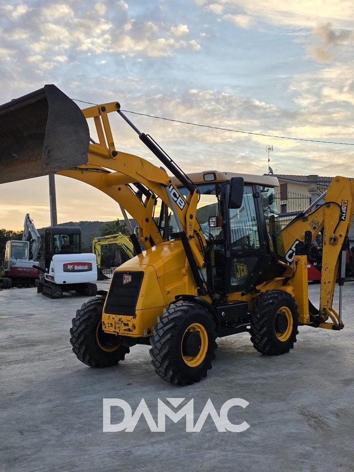 JCB 2CX - Fadromë me shkarkim nga prapa: foto 2 JCB 2CX - Fadromë me shkarkim nga prapa: foto 2