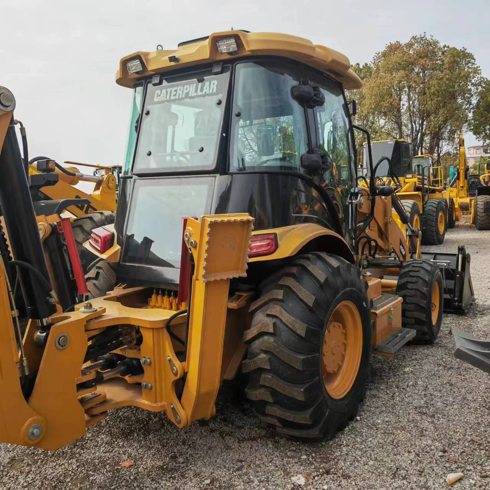 CATERPILLAR 420F - Fadromë me shkarkim nga prapa: foto 5 CATERPILLAR 420F - Fadromë me shkarkim nga prapa: foto 5