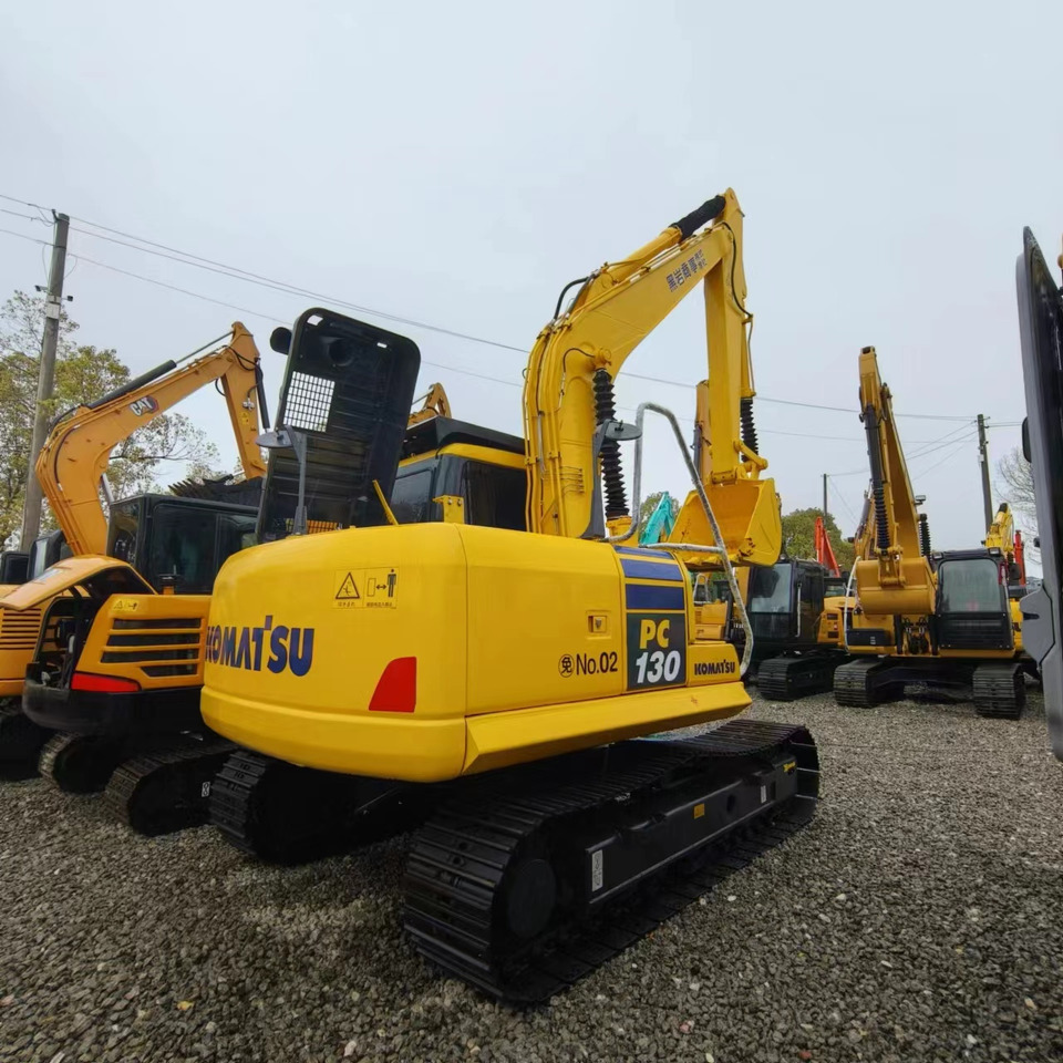 KOMATSU PC130-7 - Ekskavator me zinxhirë: foto 4 KOMATSU PC130-7 - Ekskavator me zinxhirë: foto 4