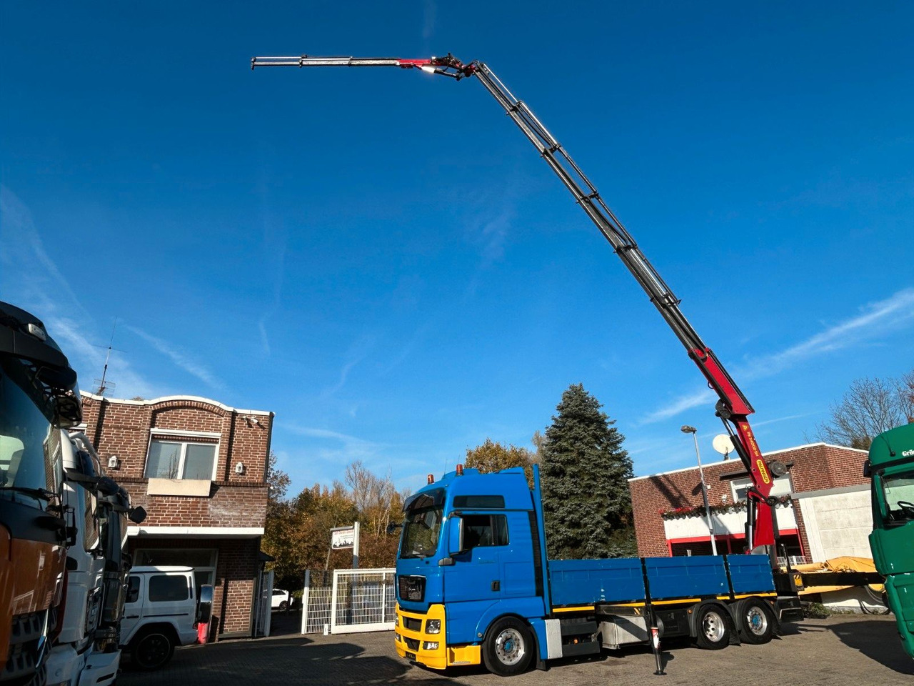 MAN 26.440 TGX Pritsche + PK 34002 + JIB Seilwinde - Kamion me vinç: foto 1 MAN 26.440 TGX Pritsche + PK 34002 + JIB Seilwinde - Kamion me vinç: foto 1
