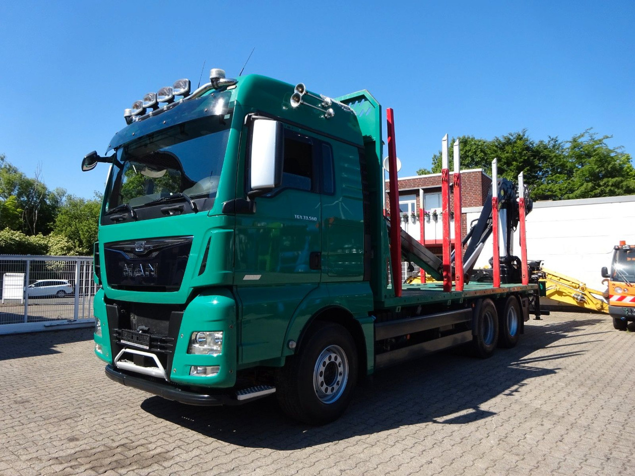 MAN 33.560 TGX mit TAJFUN L150Z Holzladekran 6x4 - Kamion për transport druri, Kamion me vinç: foto 2 MAN 33.560 TGX mit TAJFUN L150Z Holzladekran 6x4 - Kamion për transport druri, Kamion me vinç: foto 2