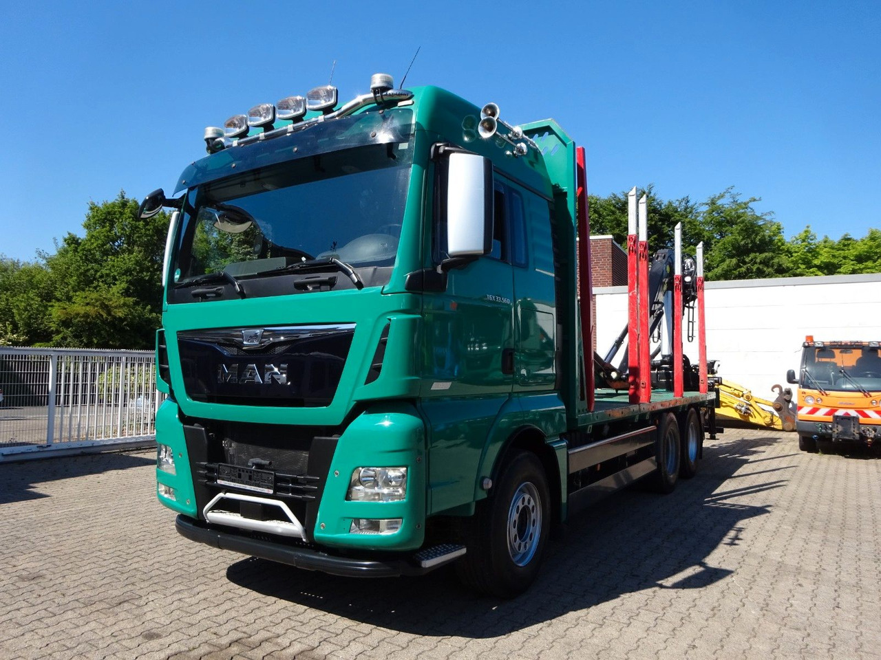 MAN 33.560 TGX mit TAJFUN L150Z Holzladekran 6x4 - Kamion për transport druri, Kamion me vinç: foto 1 MAN 33.560 TGX mit TAJFUN L150Z Holzladekran 6x4 - Kamion për transport druri, Kamion me vinç: foto 1