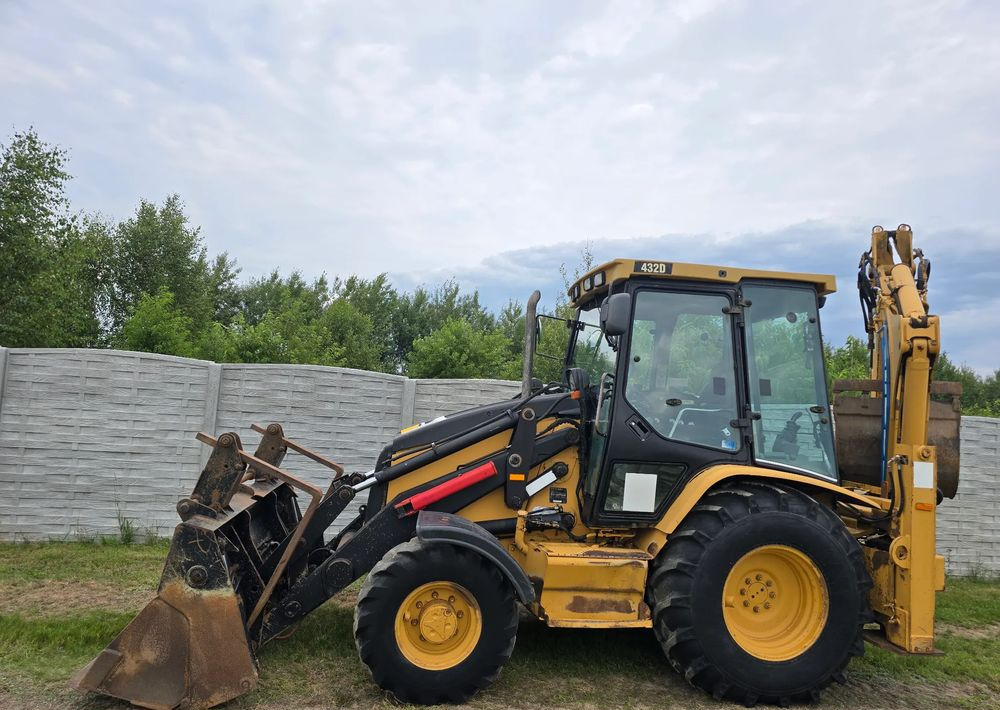 Caterpillar - Fadromë me shkarkim nga prapa: foto 4 Caterpillar - Fadromë me shkarkim nga prapa: foto 4