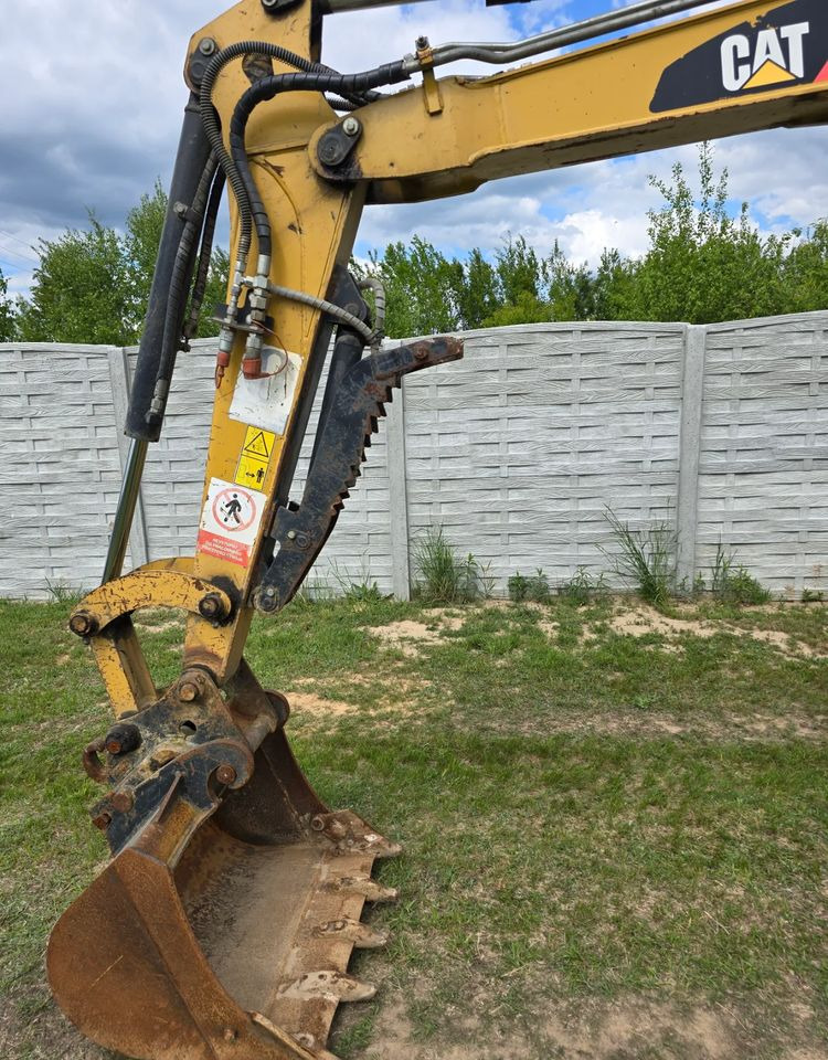 Caterpillar - Ekskavator me zinxhirë: foto 5 Caterpillar - Ekskavator me zinxhirë: foto 5