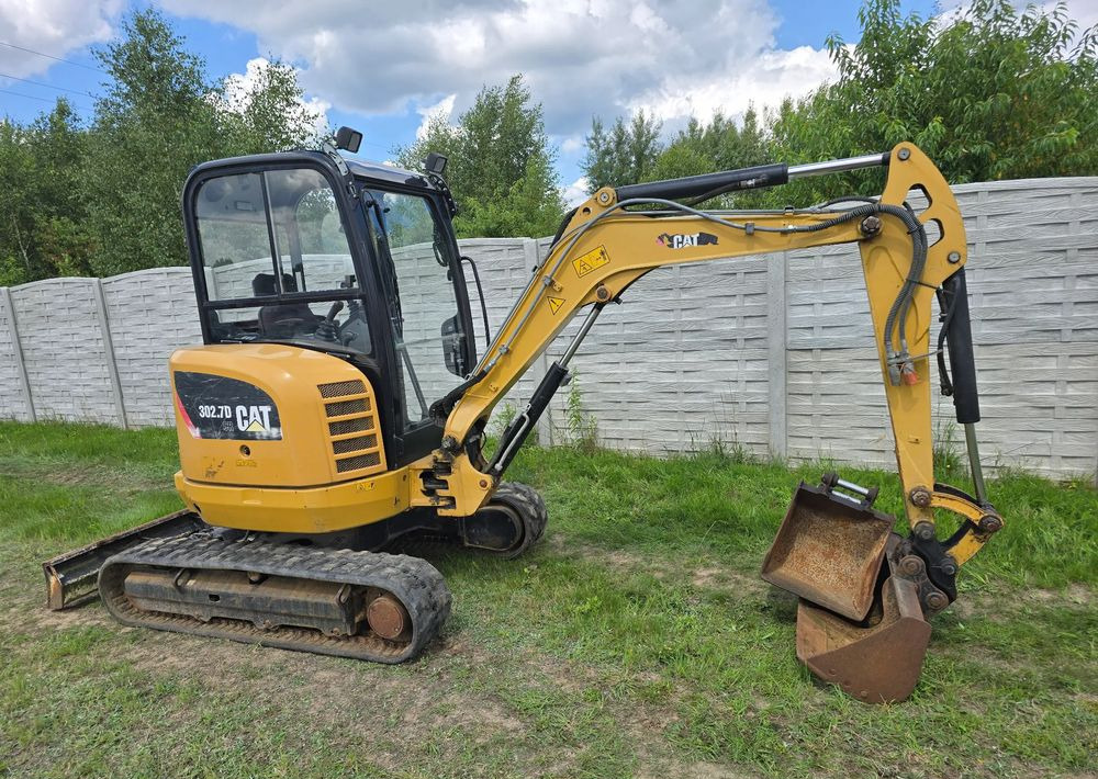 Caterpillar - Miniekskavator: foto 1 Caterpillar - Miniekskavator: foto 1