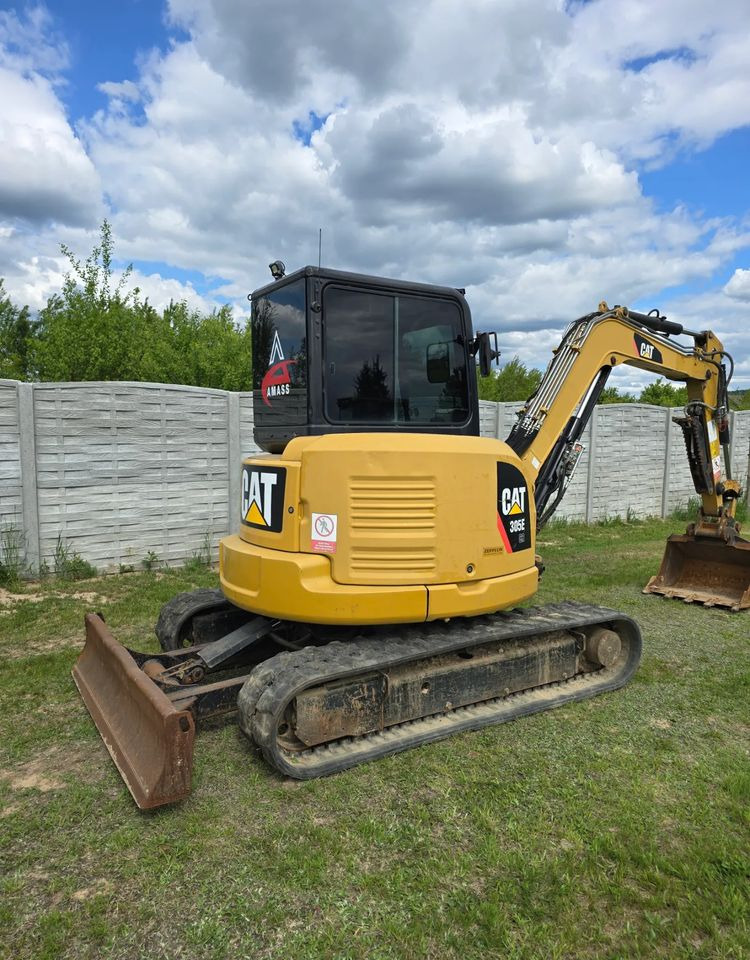 Caterpillar - Ekskavator me zinxhirë: foto 1 Caterpillar - Ekskavator me zinxhirë: foto 1