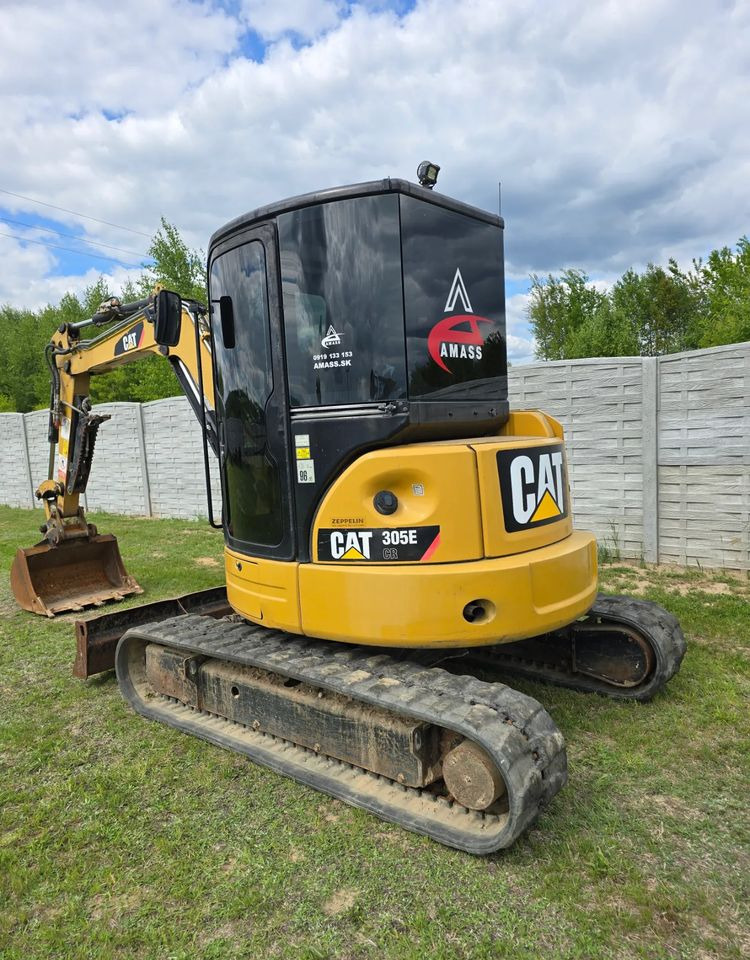 Caterpillar - Ekskavator me zinxhirë: foto 2 Caterpillar - Ekskavator me zinxhirë: foto 2