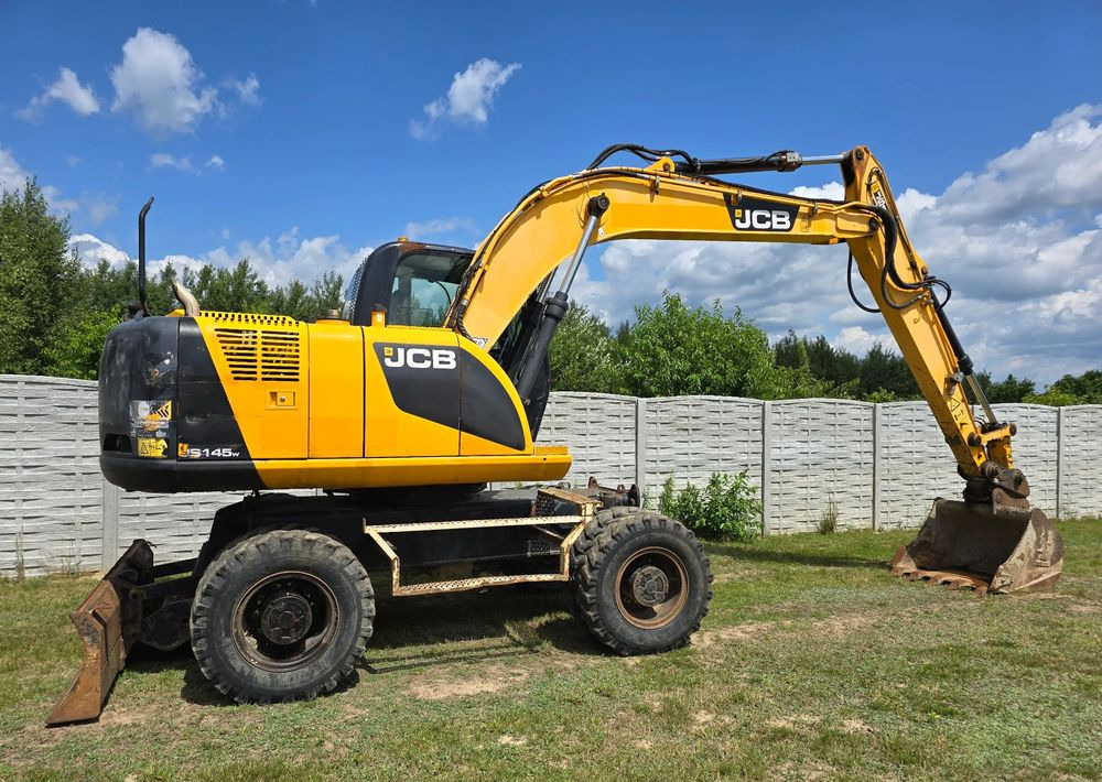 JCB - Ekskavator me goma: foto 2 JCB - Ekskavator me goma: foto 2