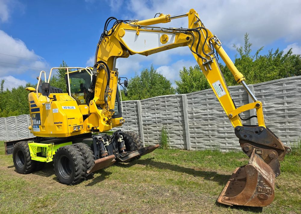 Komatsu - Ekskavator me goma: foto 2 Komatsu - Ekskavator me goma: foto 2