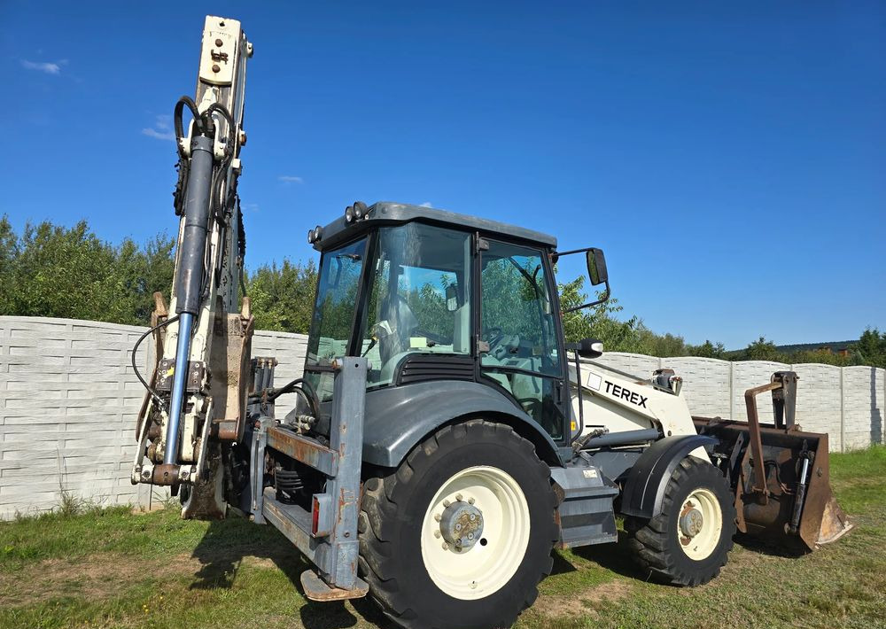 Terex - Fadromë me shkarkim nga prapa: foto 1 Terex - Fadromë me shkarkim nga prapa: foto 1