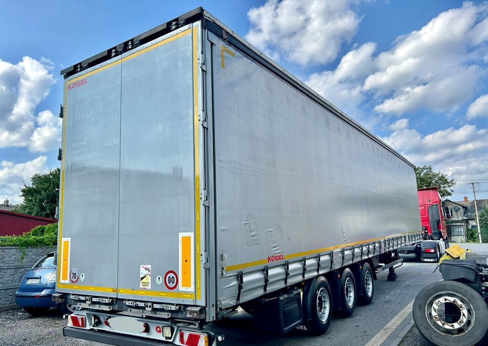 Kögel MEGA 2019 OPONY 80% SAF PODNOSZONA OŚ PODNOSZONY DACH / OD PIERWSZEGO WŁAŚCICIELA - Gjysmë rimorkio me tendë: foto 3 Kögel MEGA 2019 OPONY 80% SAF PODNOSZONA OŚ PODNOSZONY DACH / OD PIERWSZEGO WŁAŚCICIELA - Gjysmë rimorkio me tendë: foto 3