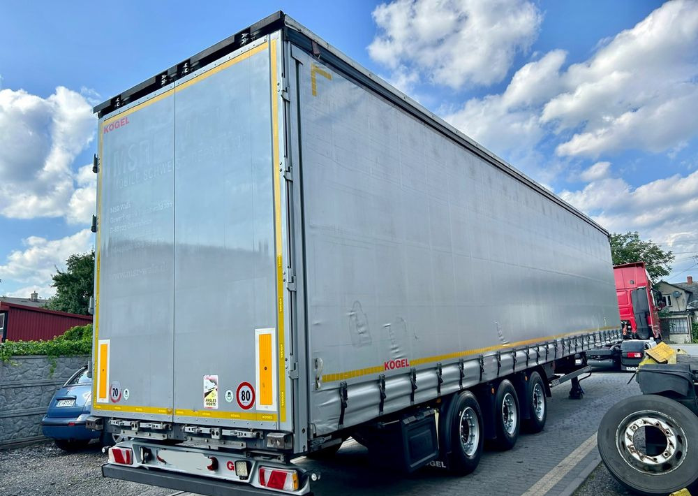 Kögel MEGA 2019 OPONY 80% SAF PODNOSZONA OŚ PODNOSZONY DACH / OD PIERWSZEGO WŁAŚCICIELA - Gjysmë rimorkio me tendë: foto 4 Kögel MEGA 2019 OPONY 80% SAF PODNOSZONA OŚ PODNOSZONY DACH / OD PIERWSZEGO WŁAŚCICIELA - Gjysmë rimorkio me tendë: foto 4