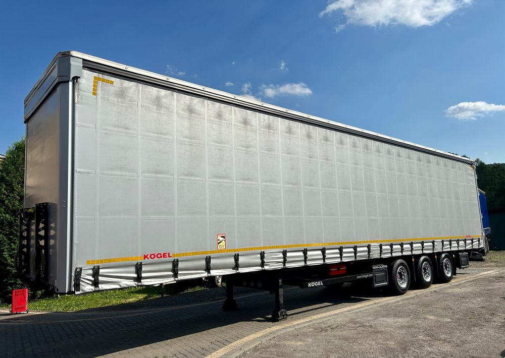 Kögel MEGA 2019 OPONY 80% SAF PODNOSZONA OŚ PODNOSZONY DACH / OD PIERWSZEGO WŁAŚCICIELA - Gjysmë rimorkio me tendë: foto 1 Kögel MEGA 2019 OPONY 80% SAF PODNOSZONA OŚ PODNOSZONY DACH / OD PIERWSZEGO WŁAŚCICIELA - Gjysmë rimorkio me tendë: foto 1